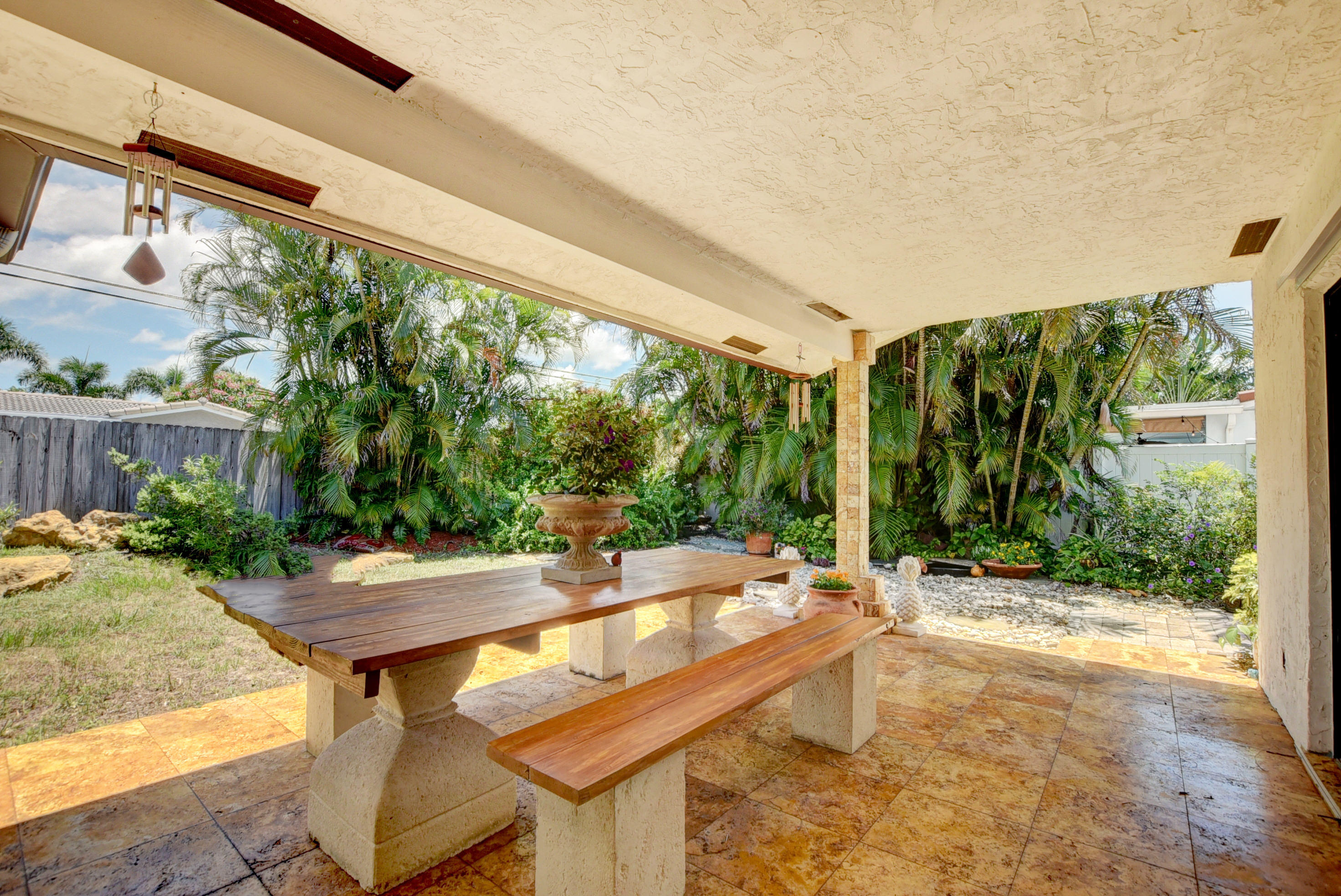 271 Northeast 26th Street Boca Raton, FL 33431 - Photo 25 of 31 Covered Back Porch w/ Raw/ Marble Floor