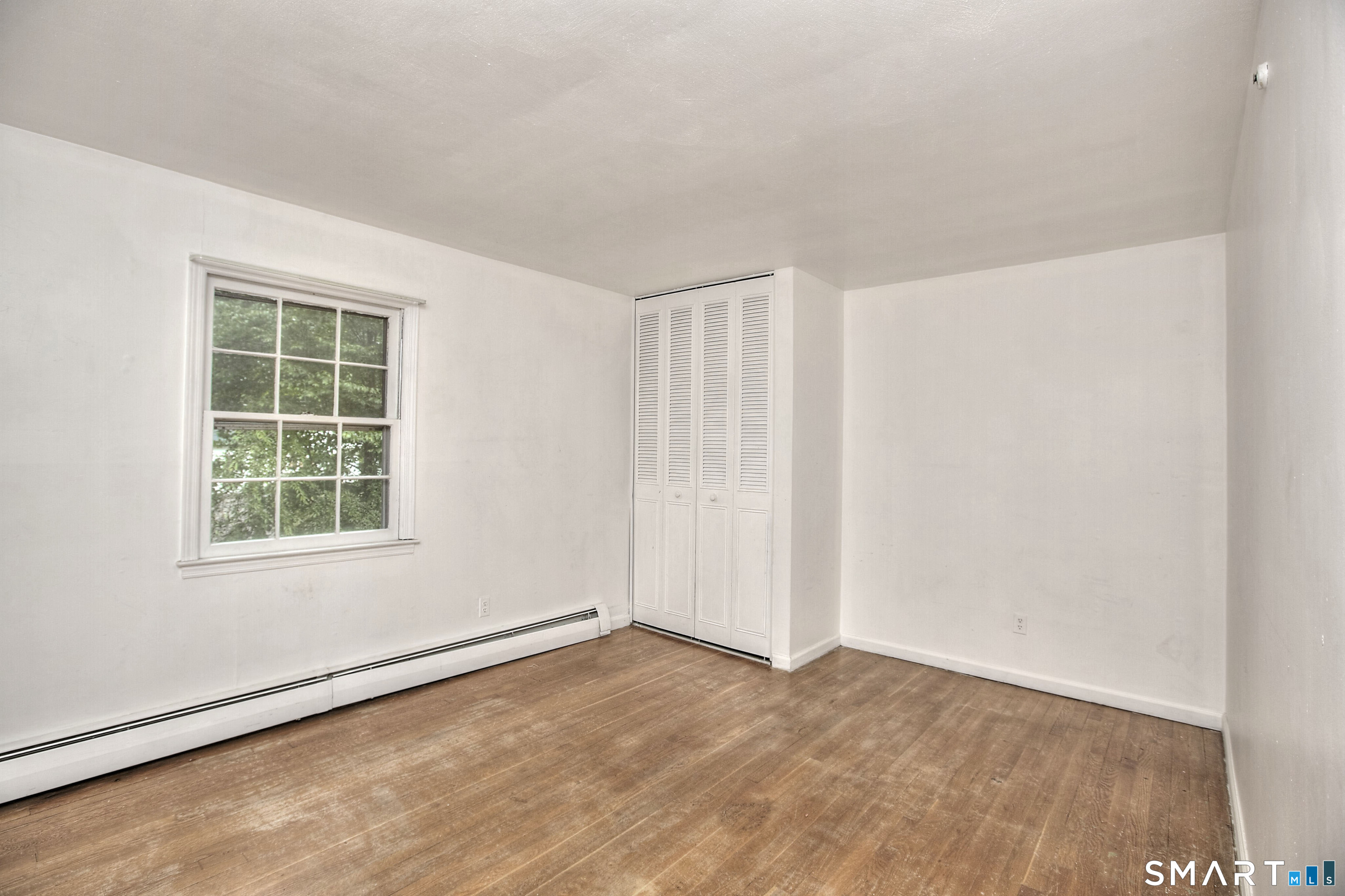 64 Russ Road Trumbull, CT 06611 - Photo 26 of 40 an empty room with a window