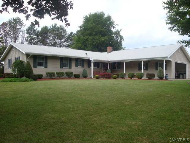 2385 Richley Road Darien, NY 14036 - Photo 1 of 1 Exterior Front Sprawling ranch situated on 12 acre
