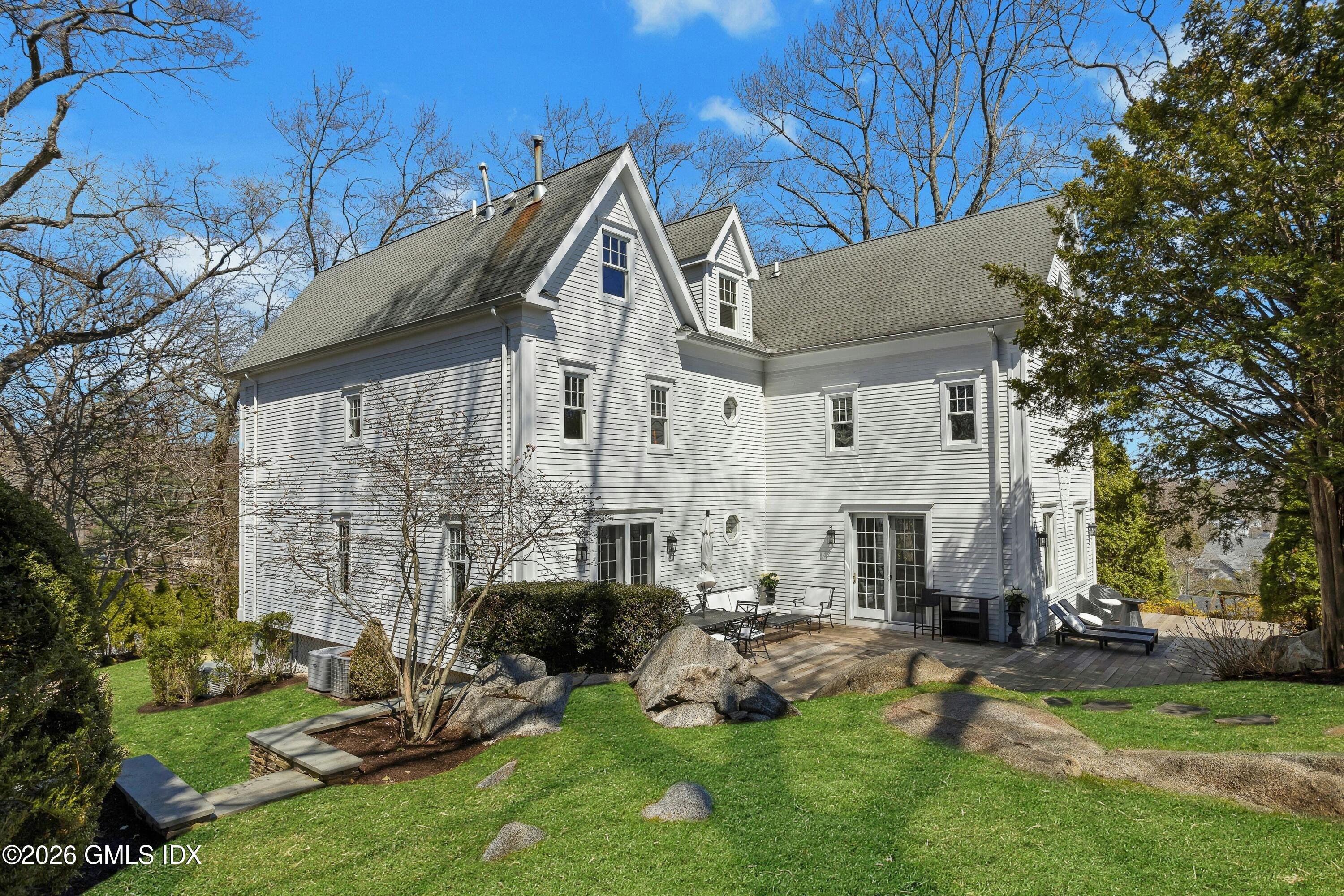 16 Summit Road Riverside, CT 06878 - Photo 3 of 34 a view of backyard with a patio and a yard