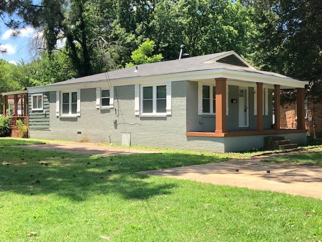 4603 Talley Road Millington, TN 38053 - Photo 1 of 16 a front view of a house with a yard
