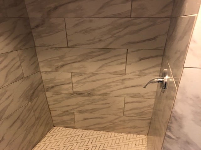4603 Talley Road Millington, TN 38053 - Photo 12 of 16 a bathroom with a shower