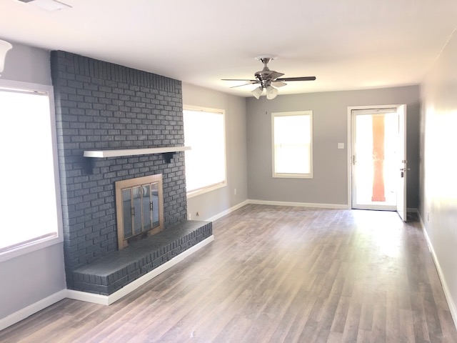 4603 Talley Road Millington, TN 38053 - Photo 3 of 16 a view of empty room with wooden floor and fan
