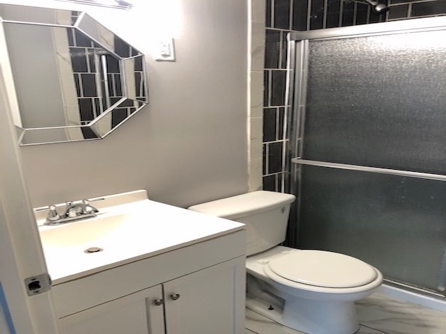 4603 Talley Road Millington, TN 38053 - Photo 5 of 16 a bathroom with a toilet and a shower