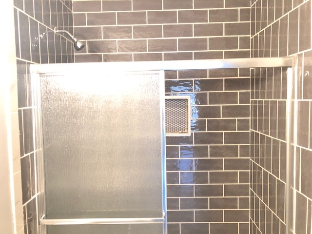 4603 Talley Road Millington, TN 38053 - Photo 7 of 16 a bathroom with a shower
