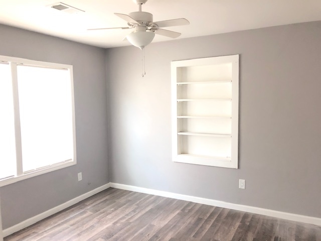 4603 Talley Road Millington, TN 38053 - Photo 9 of 16 an empty room with a window and a fan