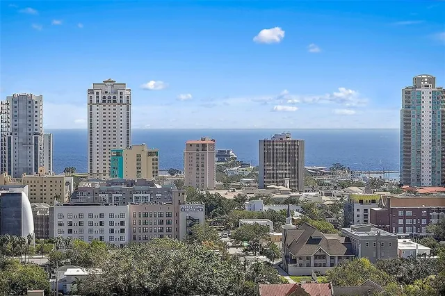 a view of a city with tall buildings
