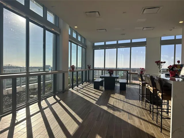 a view of an chairs and table in the balcony