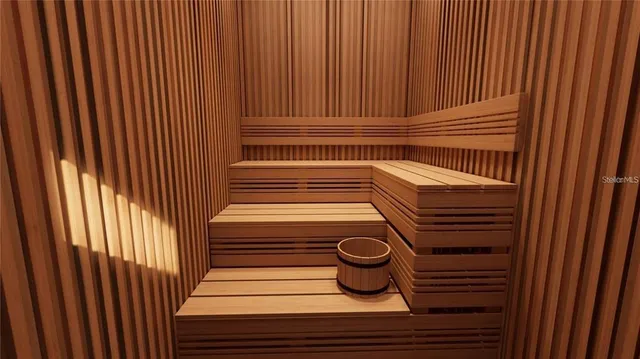 a view of a living room and kitchen