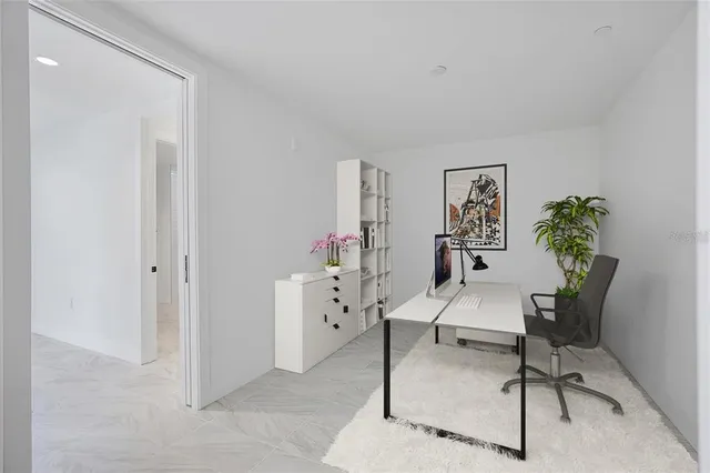 a view of a livingroom with furniture