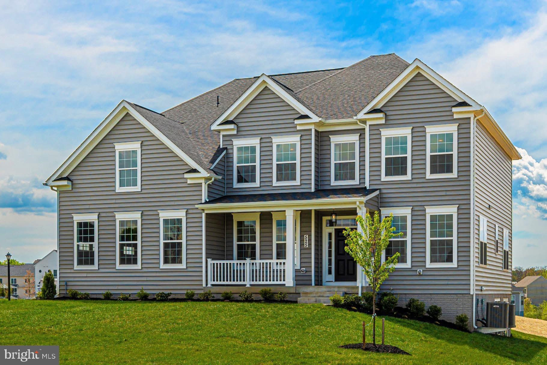 4407 Robmar Drive Mount Airy, MD 21771 - Photo 1 of 2 a view of a house with a yard