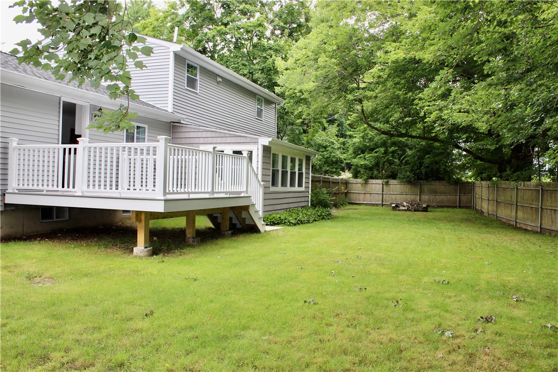 11 Manning Court Coventry, RI 02816 - Photo 39 of 43 Fenced in Backyard with Deck