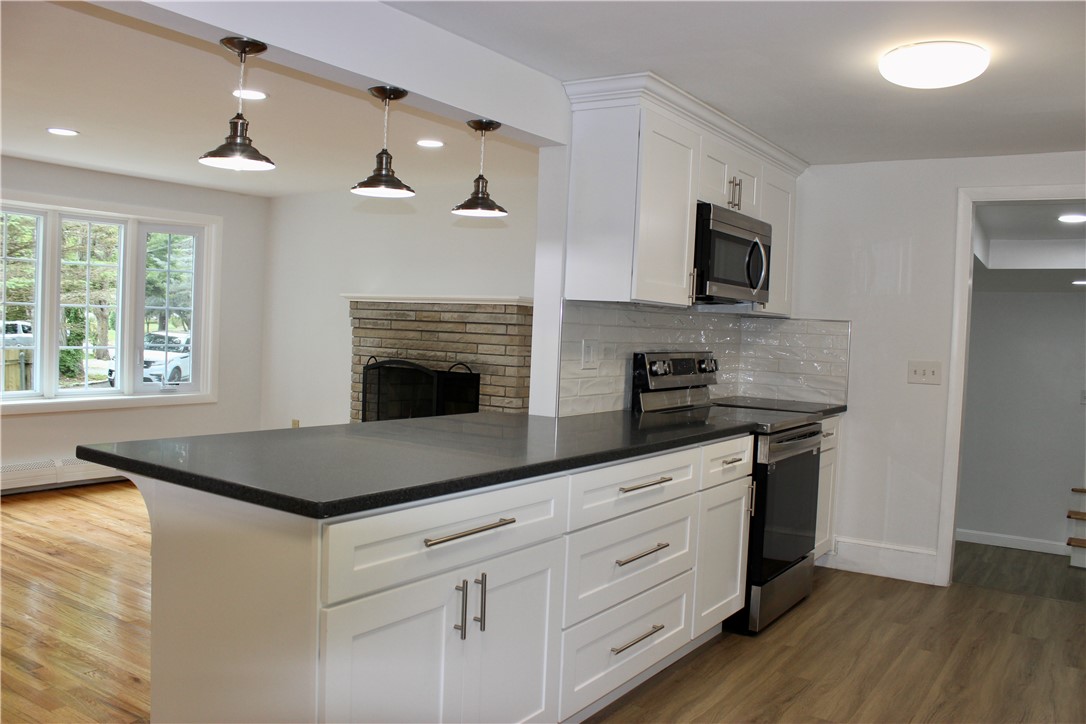 11 Manning Court Coventry, RI 02816 - Photo 5 of 43 New Kitchen to Living Room
