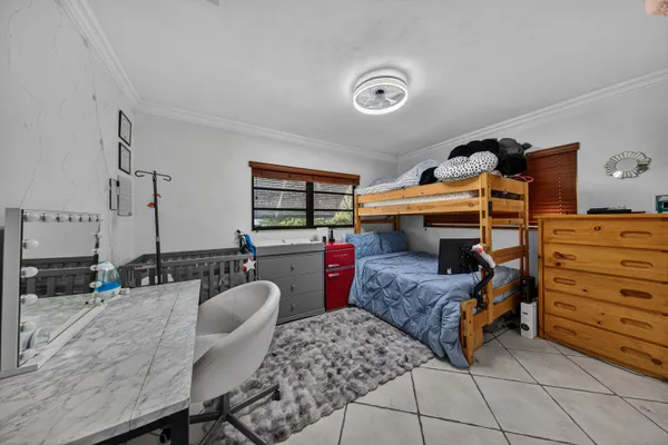 a bed room with a bed and furniture