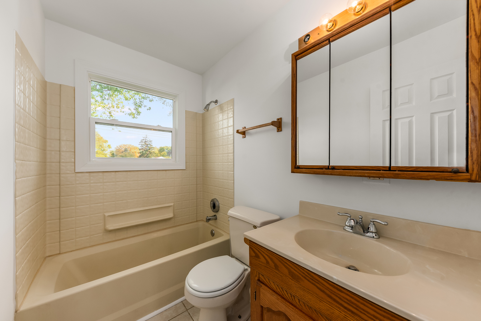 116 North Pinecrest Road Bolingbrook, IL 60440 - Photo 14 of 16 a bathroom with a sink a toilet and shower