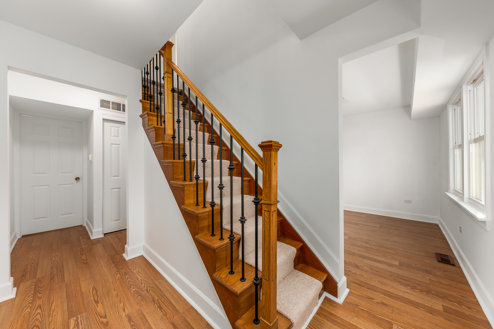 116 North Pinecrest Road Bolingbrook, IL 60440 - Photo 9 of 16 a view of an entryway with wooden floor