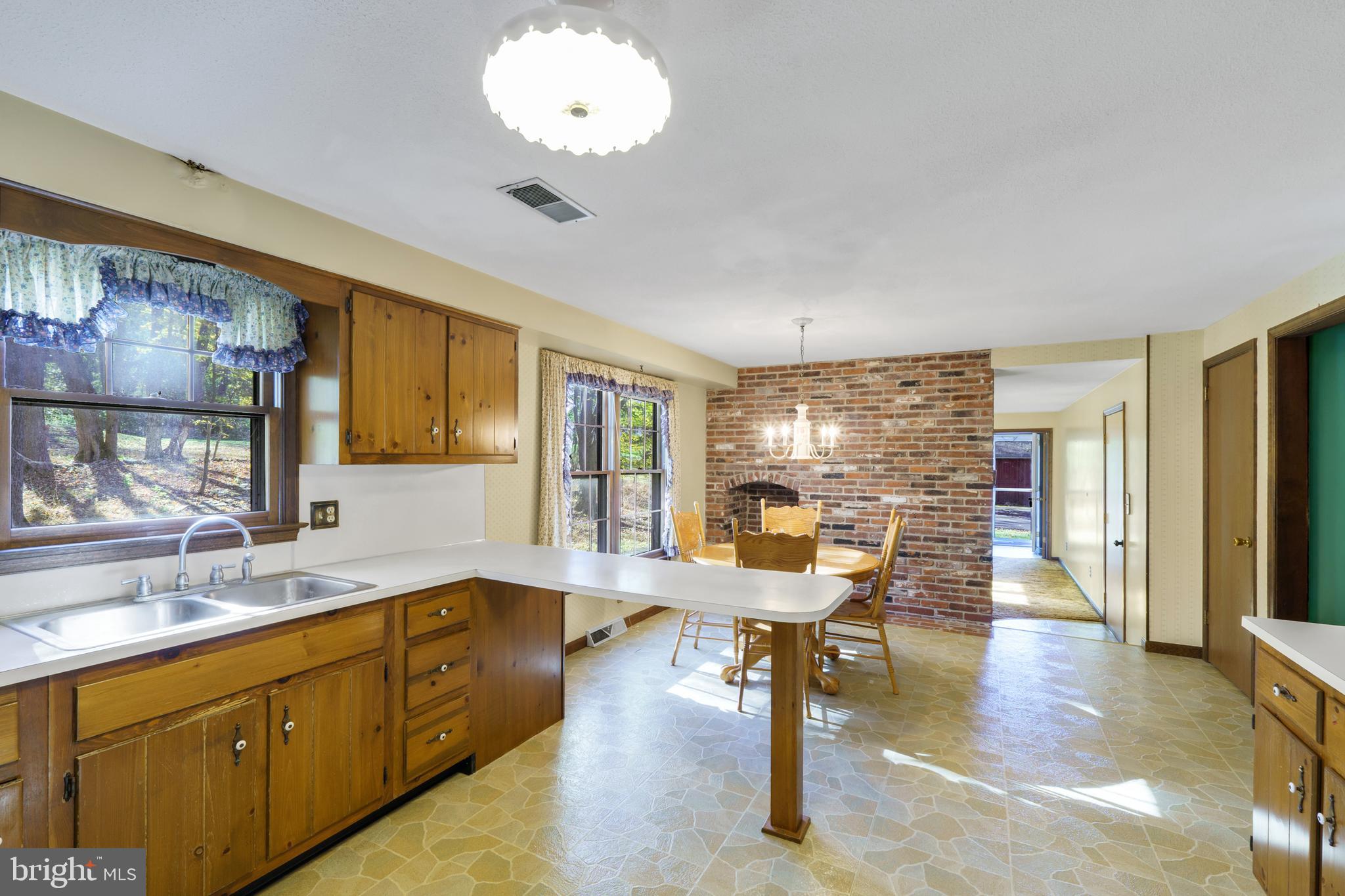 2333 Three Mile Run Road Perkasie, PA 18944 - Photo 11 of 43 a large white kitchen with a large window