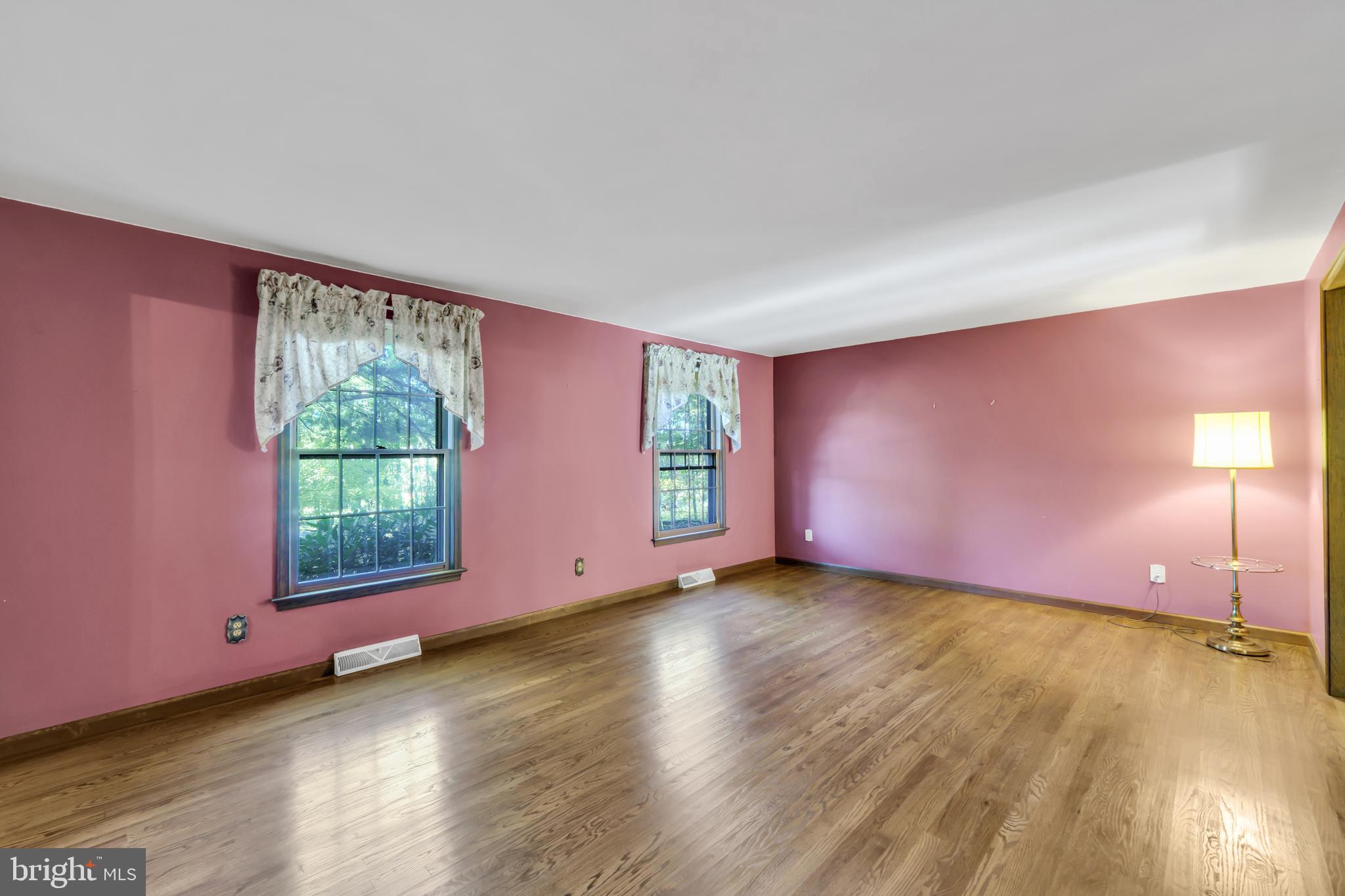 2333 Three Mile Run Road Perkasie, PA 18944 - Photo 17 of 43 a view of a livingroom with wooden floor and a window