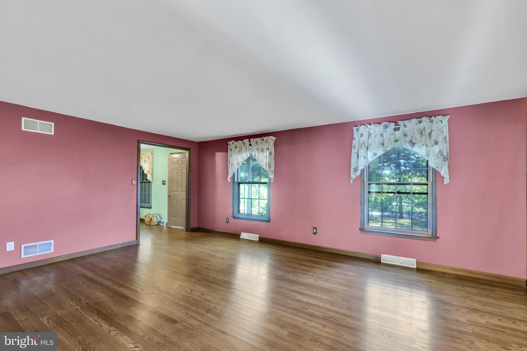 2333 Three Mile Run Road Perkasie, PA 18944 - Photo 18 of 43 a view of a livingroom with wooden floor and a window