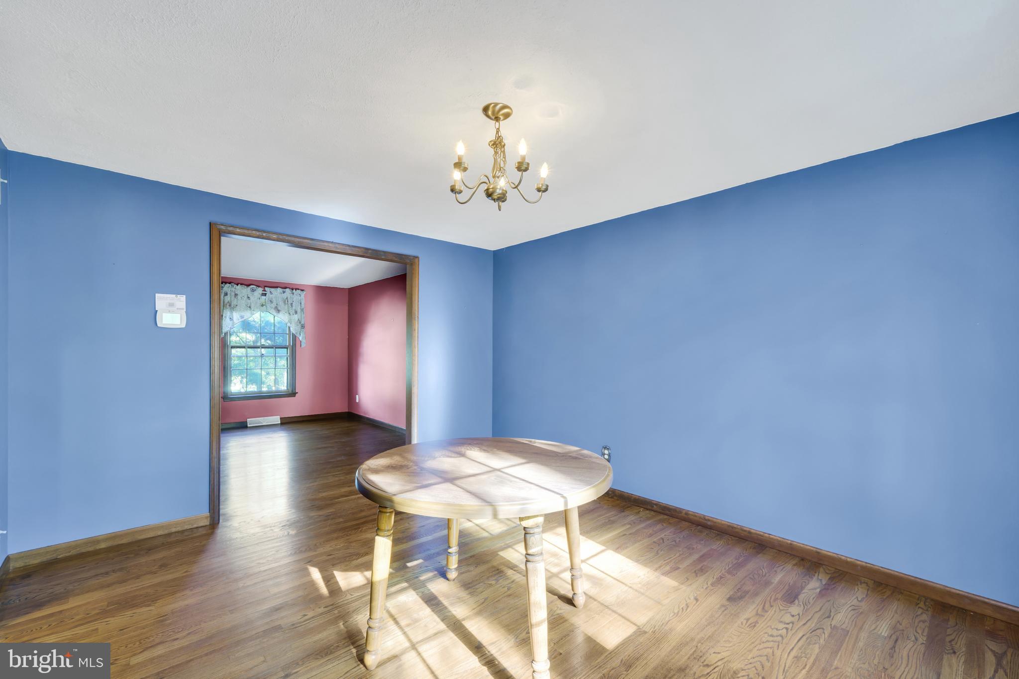 2333 Three Mile Run Road Perkasie, PA 18944 - Photo 21 of 43 a view of livingroom with hardwood floor and hallway