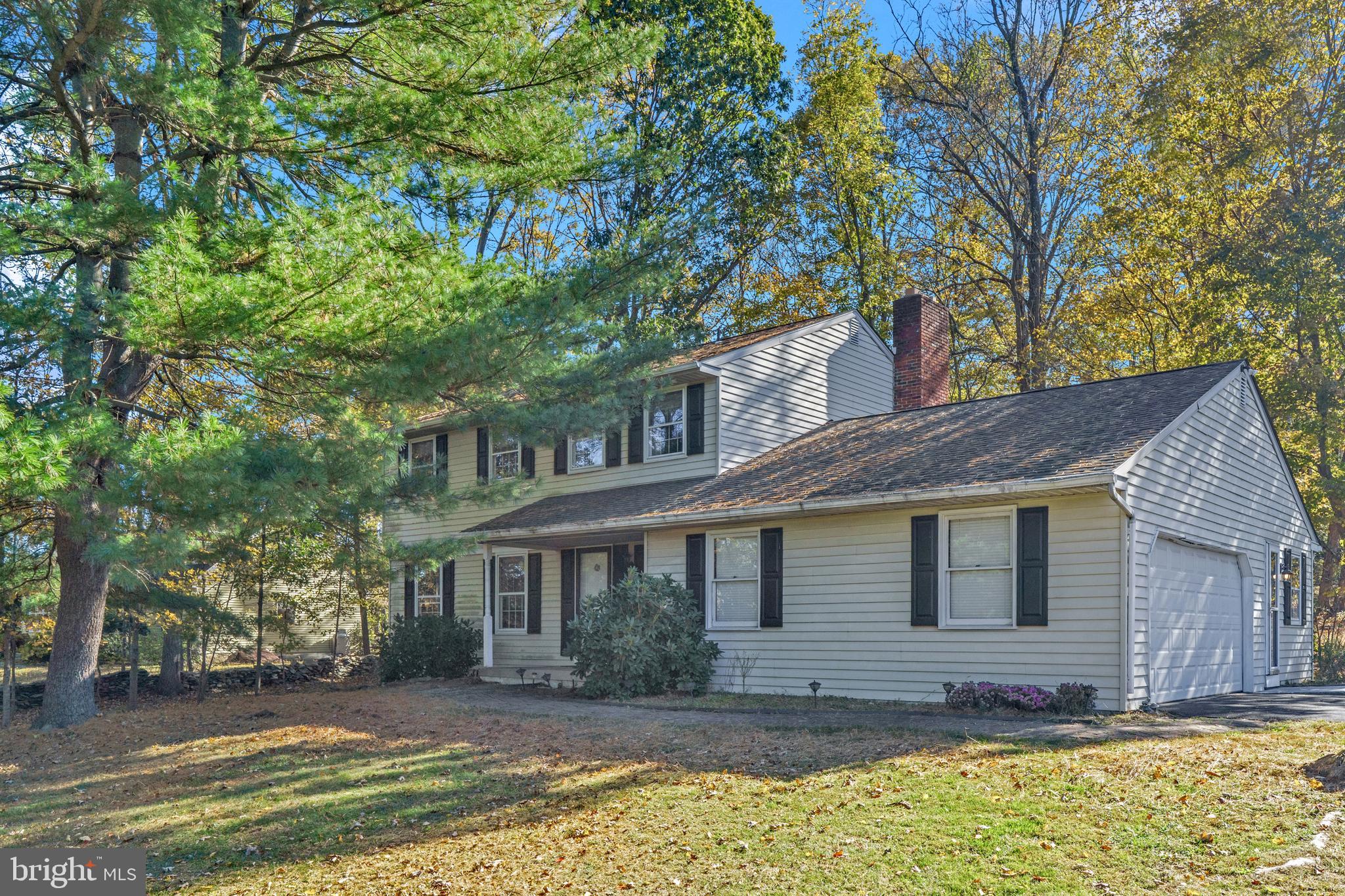 2333 Three Mile Run Road Perkasie, PA 18944 - Photo 3 of 43 a front view of a house with a yard