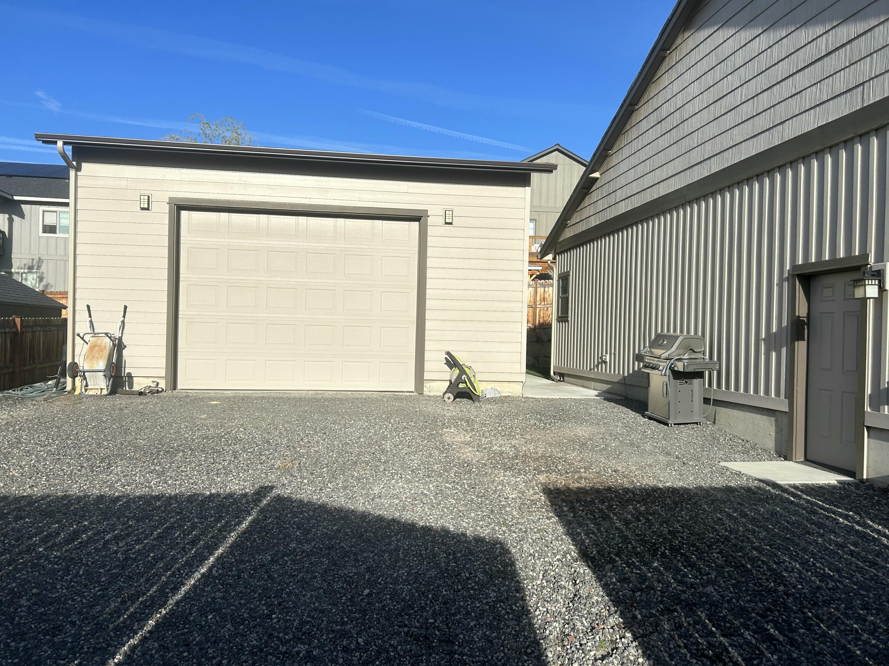 2793 Southwest 33rd Street Redmond, OR 97756 - Photo 5 of 44 a house view with a backyard space