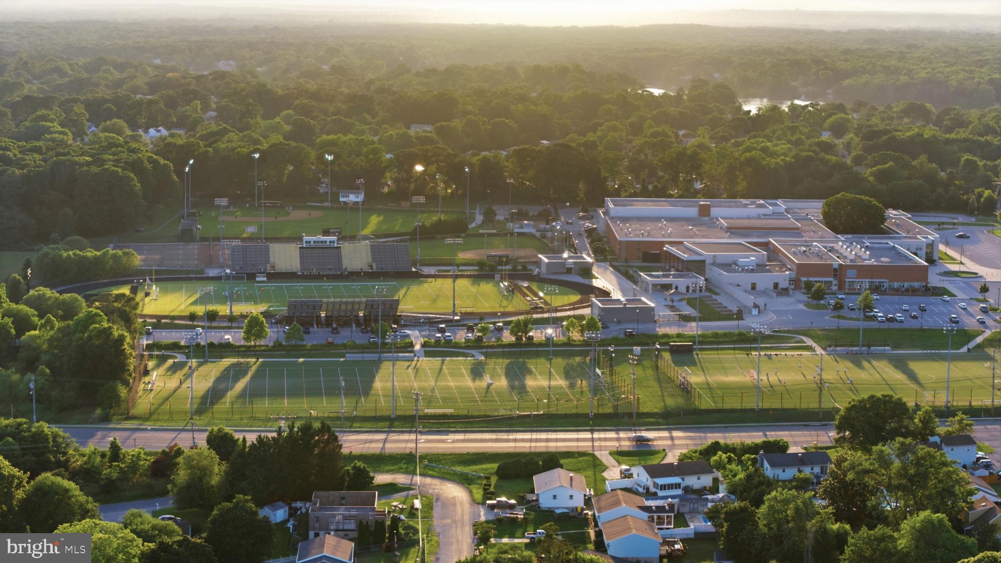 1219 Meadow View Road Pasadena, MD 21122 - Photo 64 of 70 Sunset over a vibrant school campus.