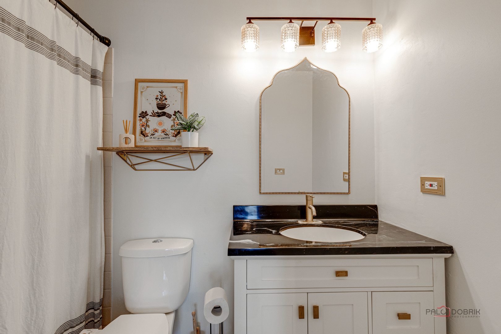 122 East Winchester Road, Unit E Libertyville, IL 60048 - Photo 7 of 17 a bathroom with a sink and a mirror