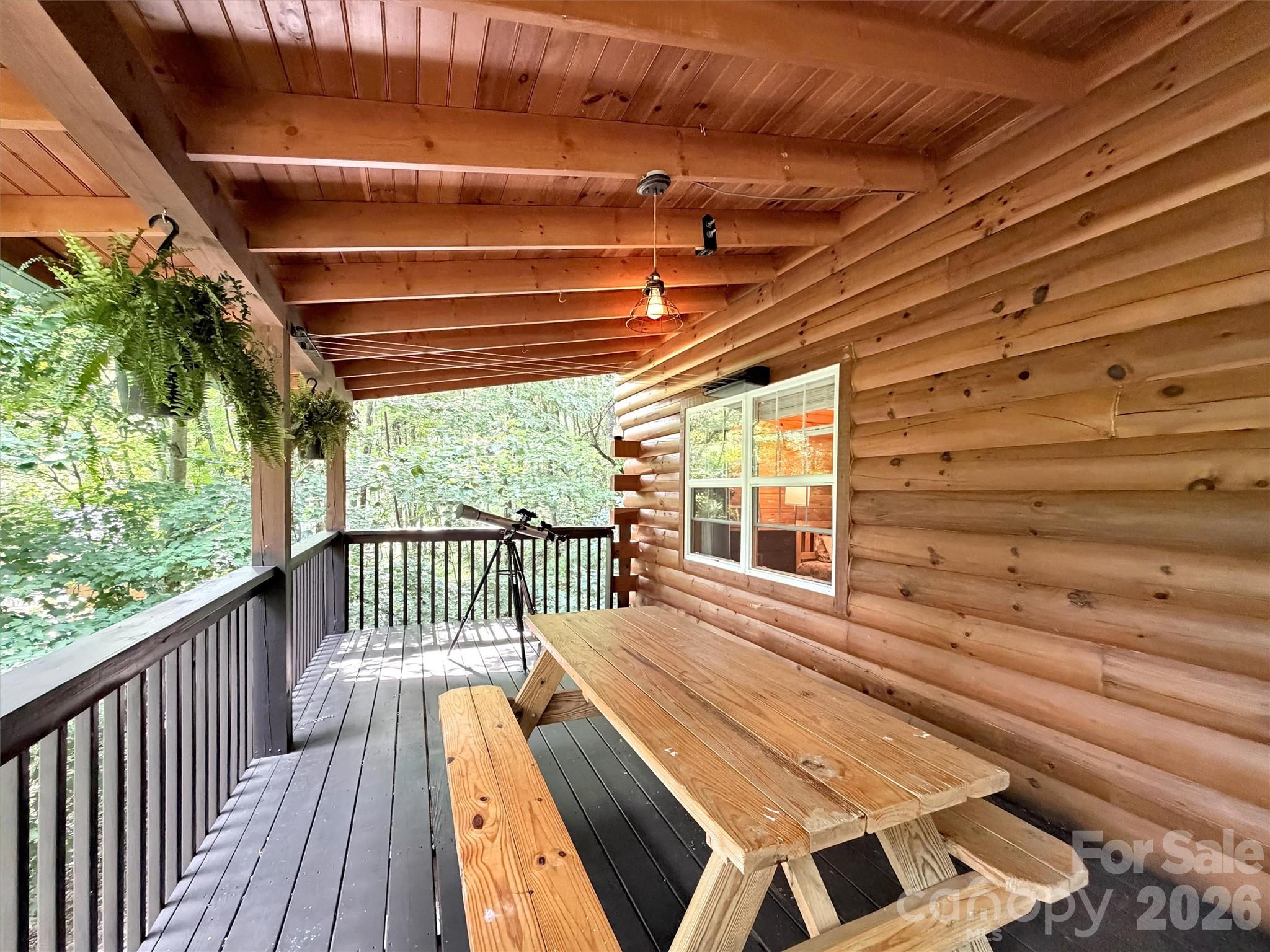 49 Brandywine Road Waynesville, NC 28786 - Photo 13 of 38 a view of a balcony with wooden floor