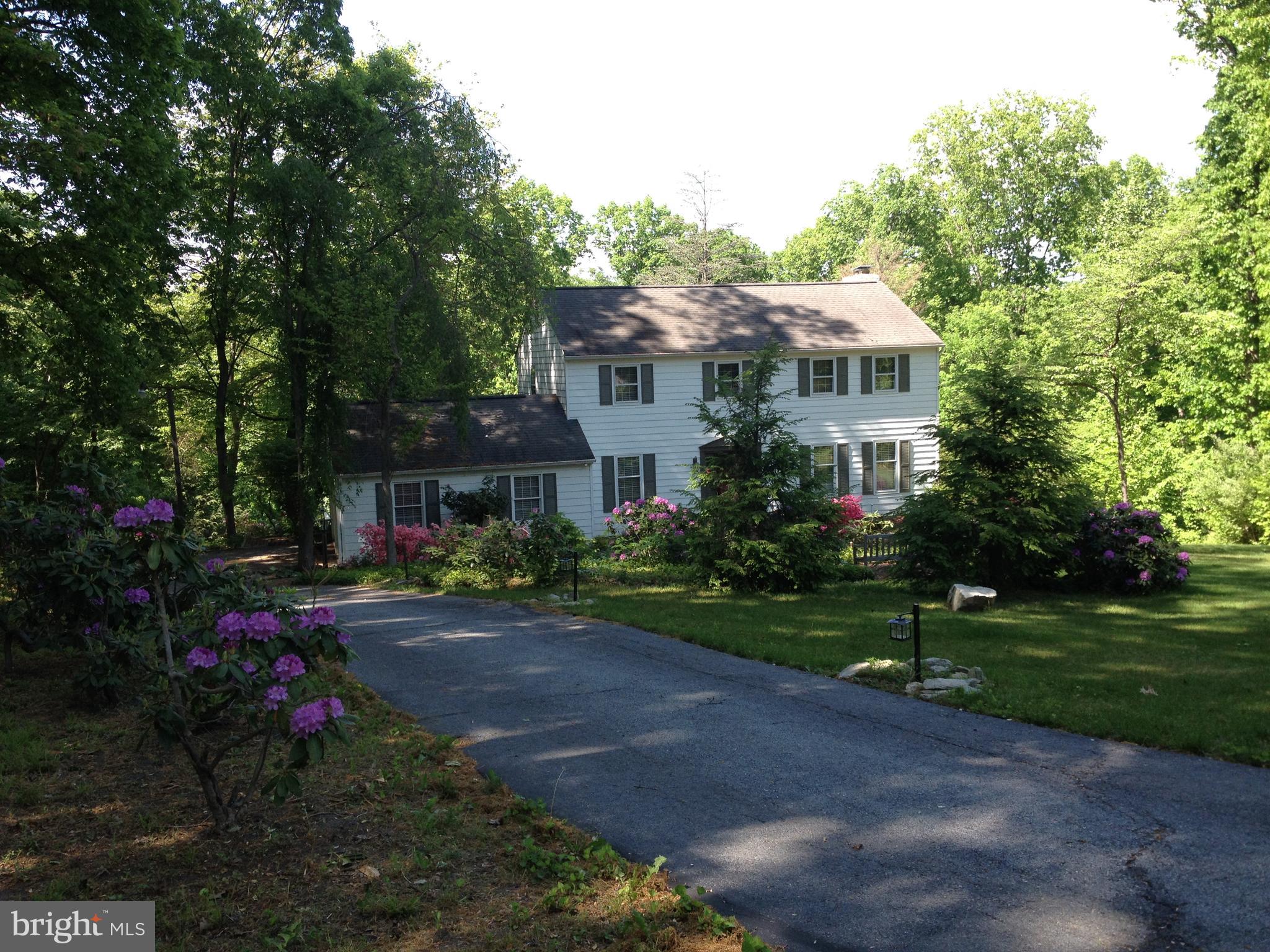 39 Blakely Road Downingtown, PA 19335 - Photo 38 of 42 Summer view from street