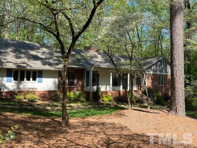 9627 Barton Creek Road Raleigh, NC 27615 - Photo 1 of 30 front view of a house with a yard