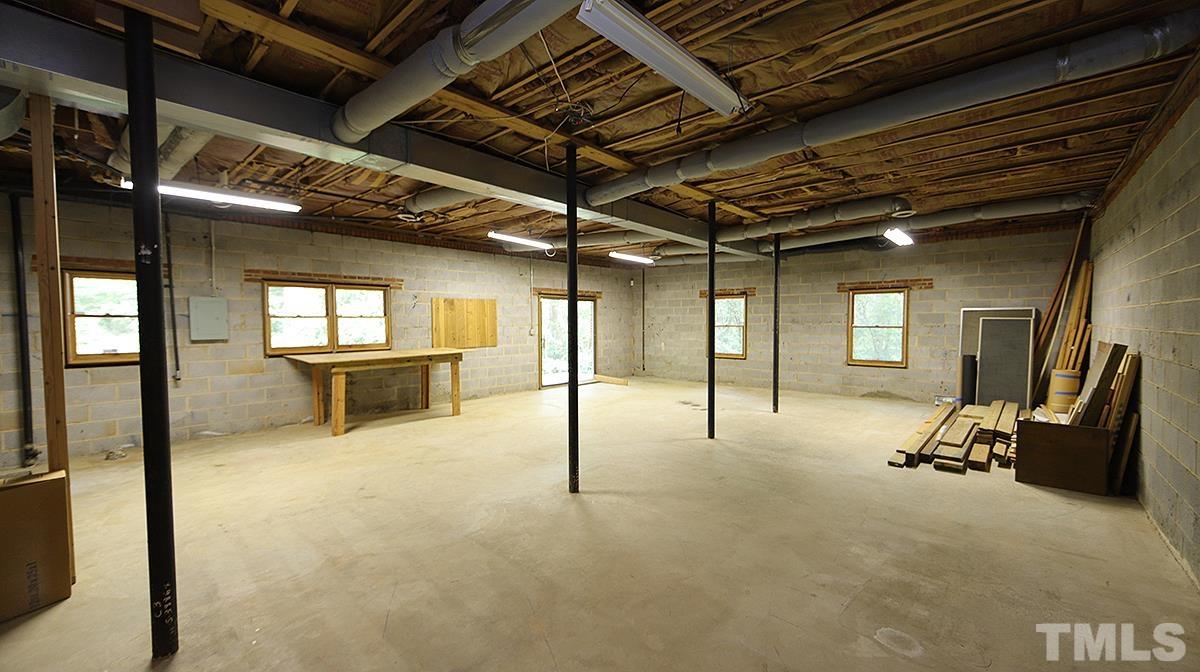 9627 Barton Creek Road Raleigh, NC 27615 - Photo 23 of 30 a view of a room with gym equipment