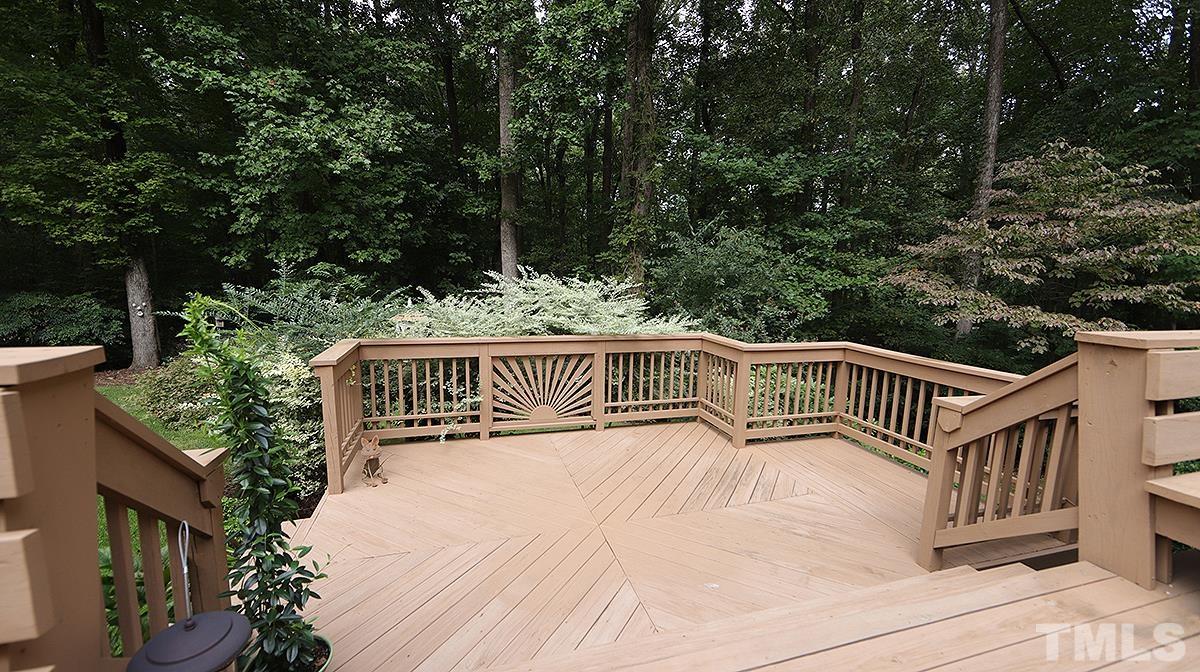 9627 Barton Creek Road Raleigh, NC 27615 - Photo 26 of 30 a view of balcony with deck and trees