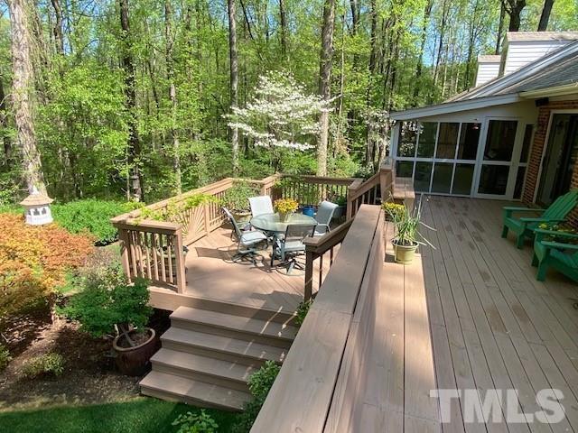 9627 Barton Creek Road Raleigh, NC 27615 - Photo 5 of 30 a view of a house with backyard