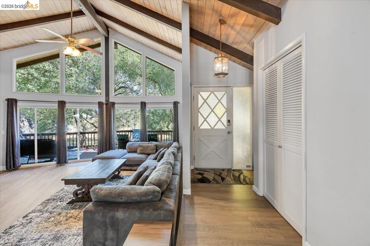 8733 Fraguero Road Sonora, CA 95370 - Photo 19 of 73 Vaulted wood-paneled ceiling with exposed beams