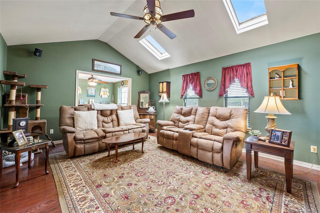 482 Prince Lane Fate, TX 75087 - Photo 14 of 32 a living room with furniture and a rug