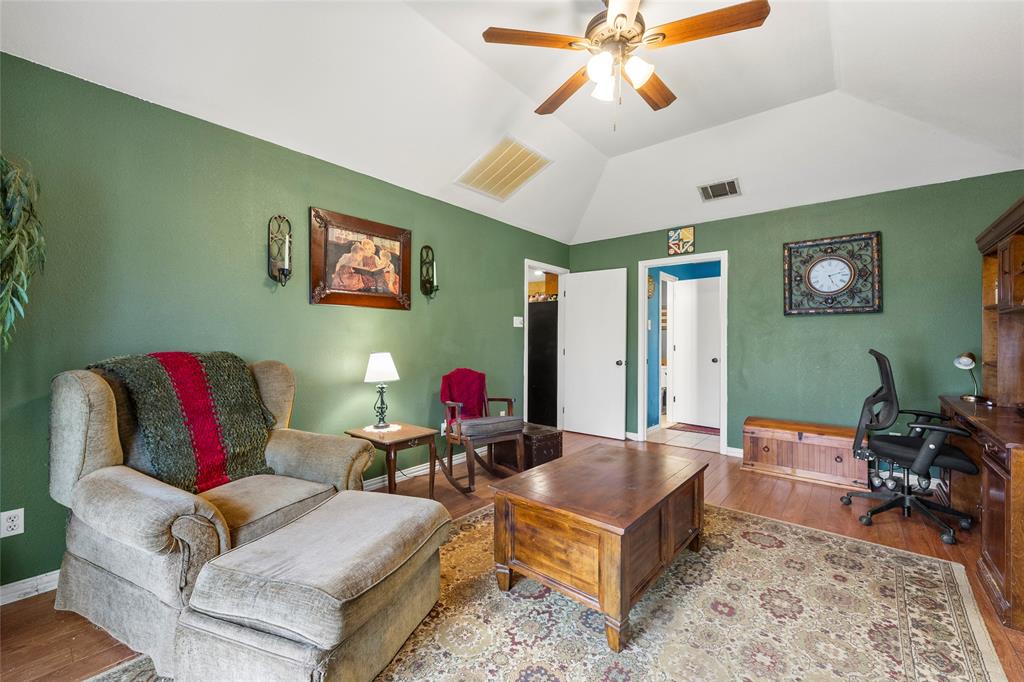 482 Prince Lane Fate, TX 75087 - Photo 26 of 32 a living room with furniture and a rug