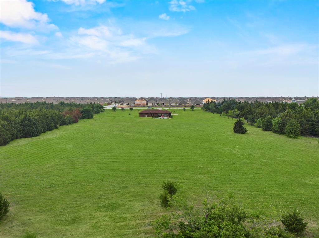 482 Prince Lane Fate, TX 75087 - Photo 32 of 32 a view of a green field with clear sky