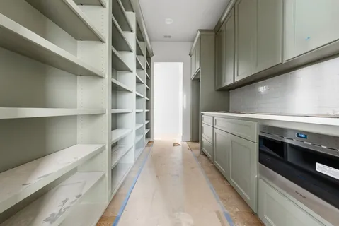 a view of empty room with windows