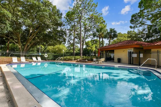 an aerial view of house with yard
