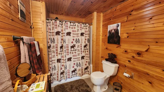a dining room with furniture wooden floor a chandelier