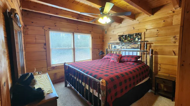 a bedroom with a bed and a walk in closet