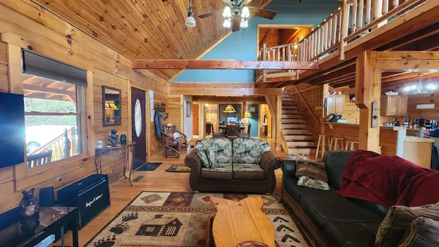 a view of a hallway with stairs