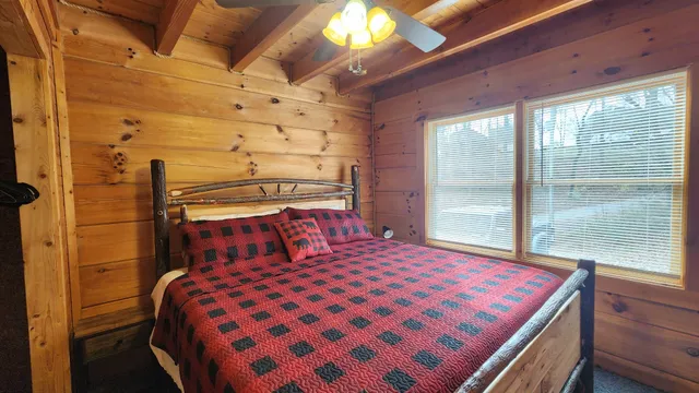 a front view of a house with a lot of windows