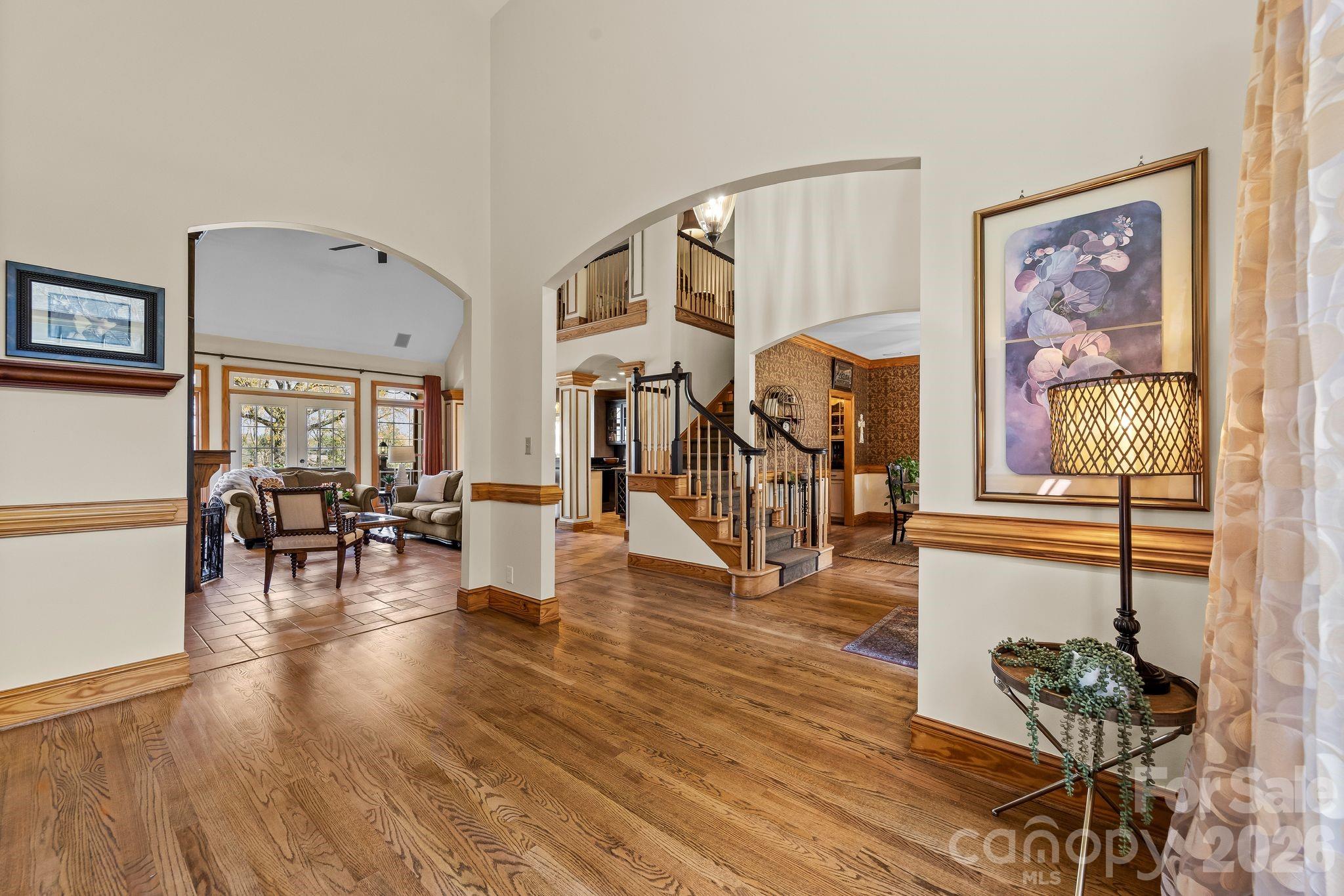 3530 Cardiff Lane Matthews, NC 28104 - Photo 11 of 39 a living room with furniture and wooden floor