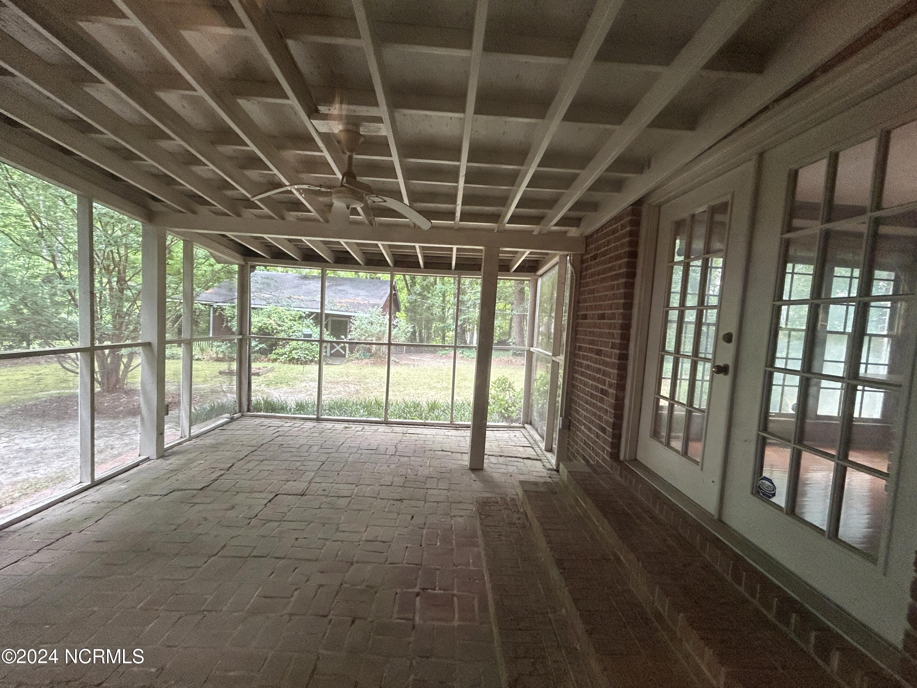 1054 Oakview Road Williamston, NC 27892 - Photo 20 of 30 Screen porch off family room