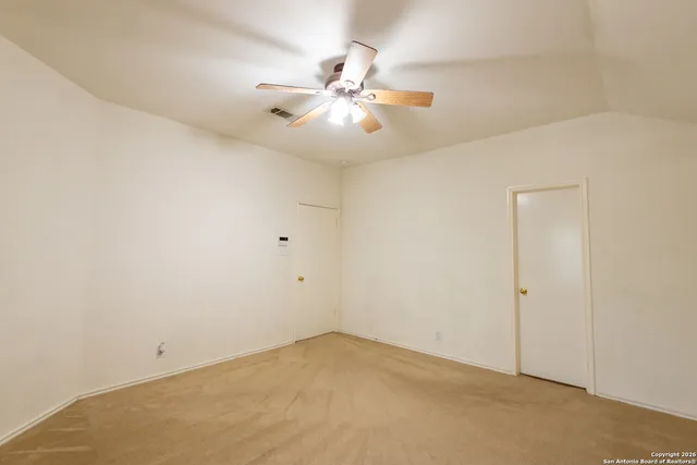a bathroom with a double vanity sink a mirror and a bathtub