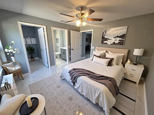 a bathroom with a sink and mirror with toilet