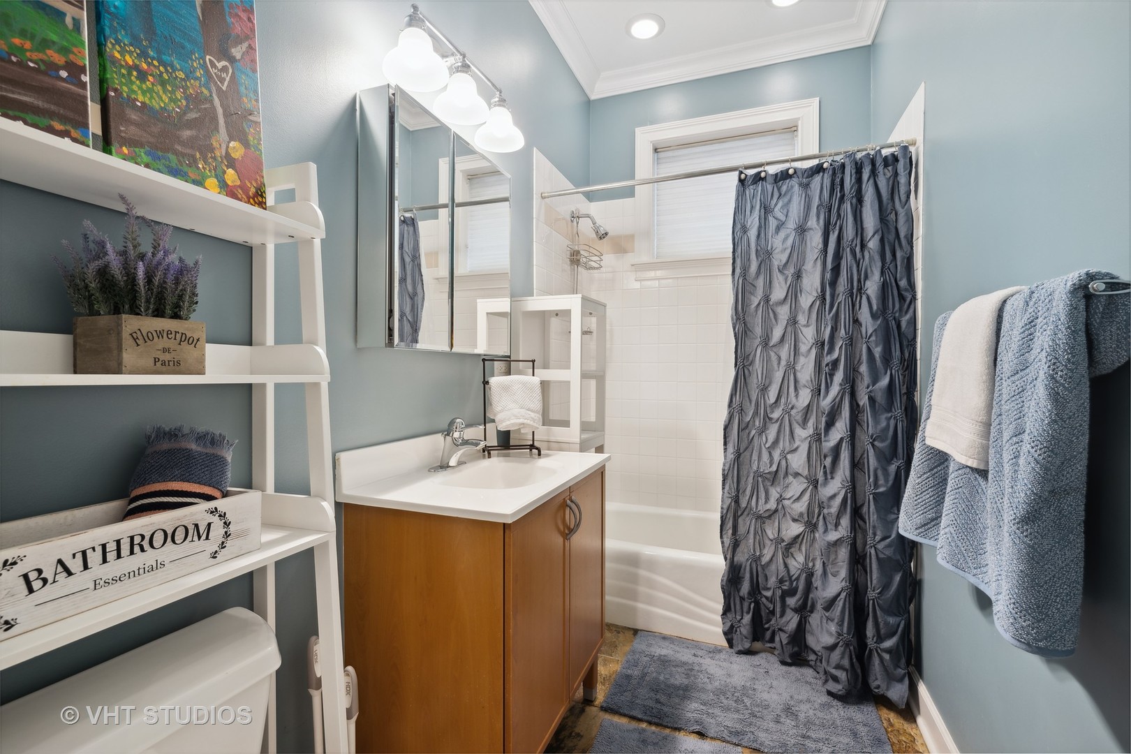 2128 West Walton Street, Unit 1E Chicago, IL 60622 - Photo 14 of 23 a view of walk in closet with clothes and shoes