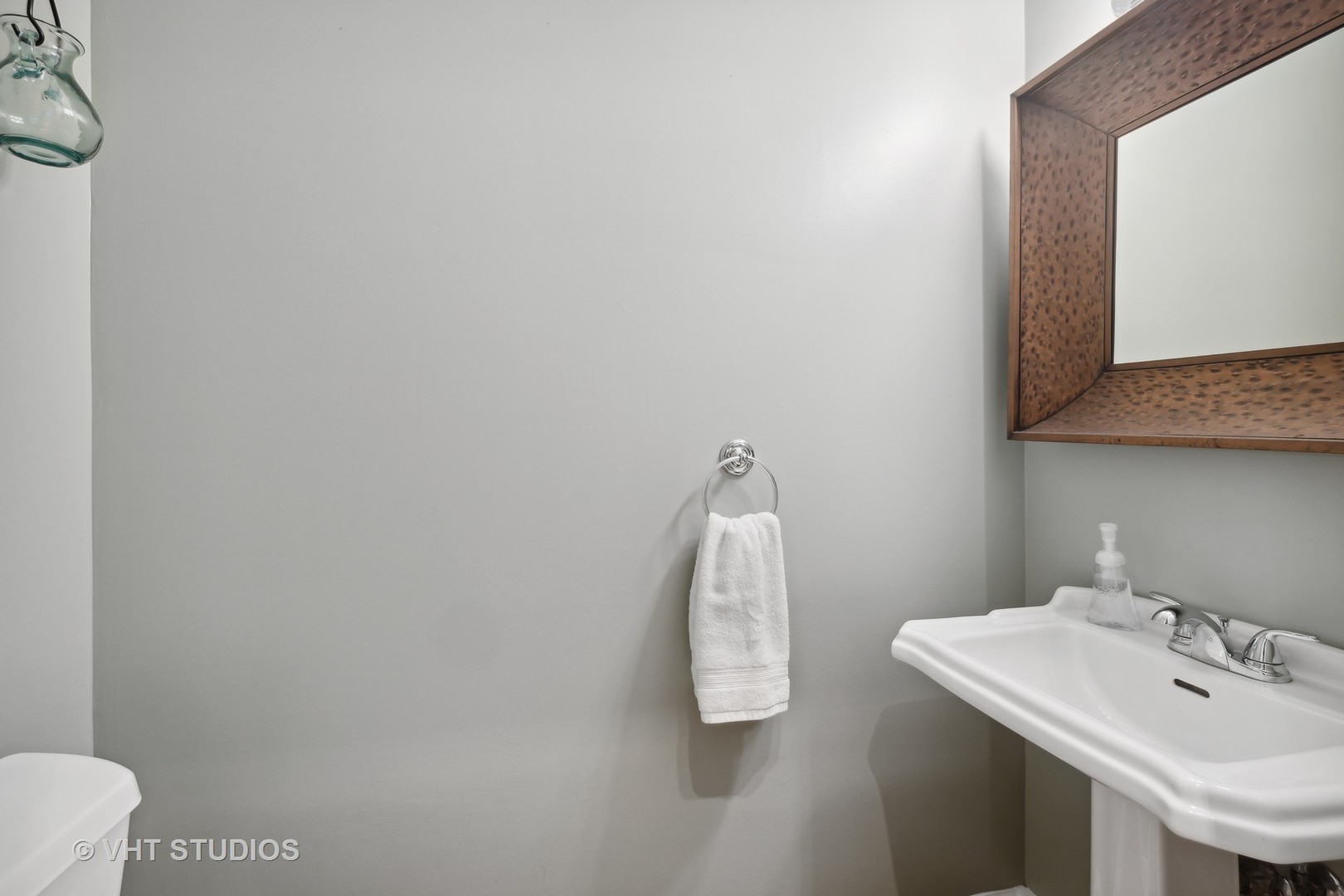 2128 West Walton Street, Unit 1E Chicago, IL 60622 - Photo 16 of 23 a bathroom with a sink and a mirror